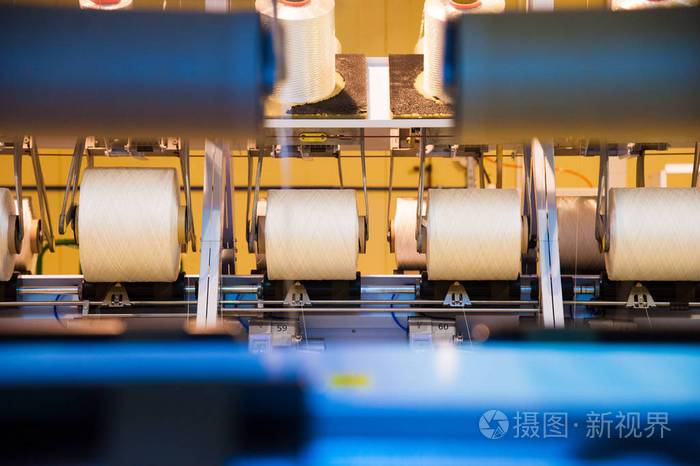 纺织厂织织机照片-正版商用图片0sl0rt-摄图新视界